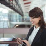 businesswoman-using-digital-tablet-on-platform-GR57MX2-scaled.jpg